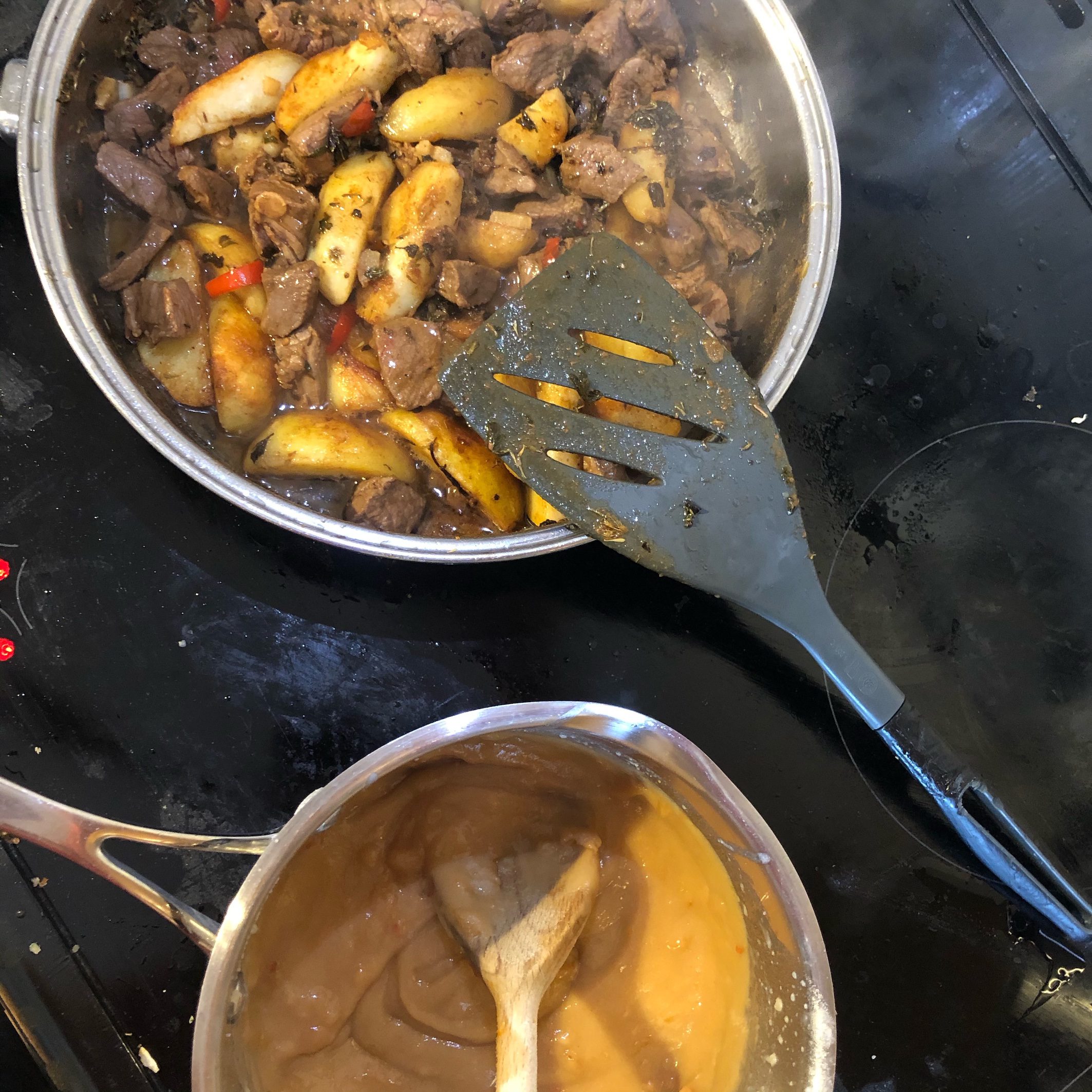 Garlic butter steak and potato skillet with broth sauce